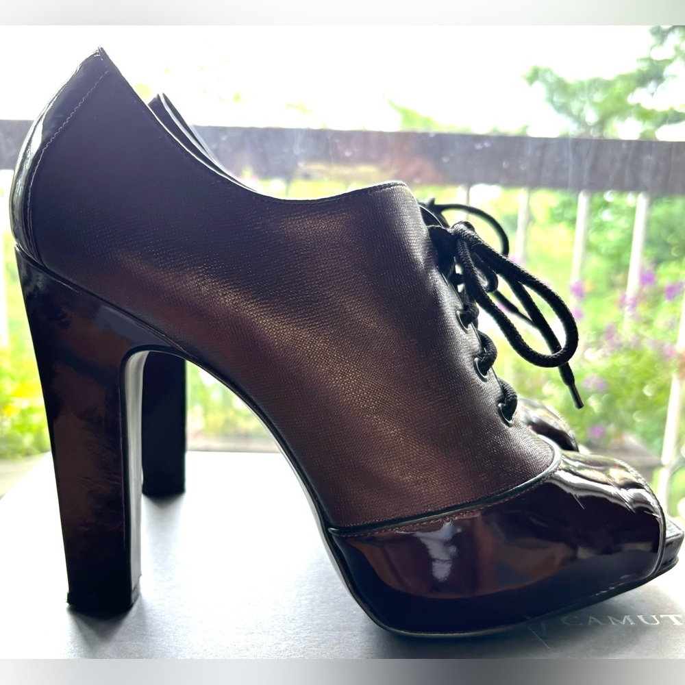 Vince Camuto Maran Lace Up
Peep Toe Platform Bootie
9.5B, Heel: 4.75”